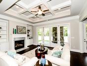 Family Room featuring Coffered Ceilings & Nana Wall bi-fold doors in the Callahan by Waterford Homes at Regency Point